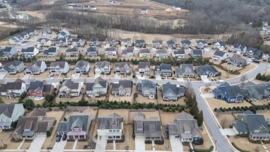 Welcome to this one-of-a-kind, John Wieland, 4-bedroom on Reunion Golf Club in Georgia - for sale on GolfHomes.com, golf home, golf lot