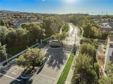 This breathtaking 5 bedroom, 4 bathroom home in the prestigious on TPC At Valencia in California - for sale on GolfHomes.com, golf home, golf lot