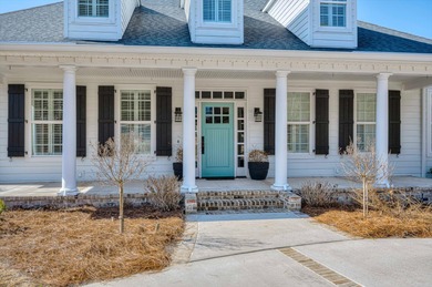 Wonderful coastal vibe home overlooking Cunning Lake. Coveted on The Reserve Club At Woodside Plantation in South Carolina - for sale on GolfHomes.com, golf home, golf lot