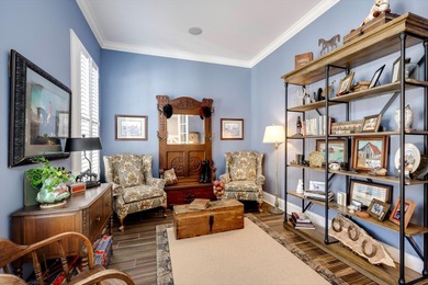 Wonderful coastal vibe home overlooking Cunning Lake. Coveted on The Reserve Club At Woodside Plantation in South Carolina - for sale on GolfHomes.com, golf home, golf lot