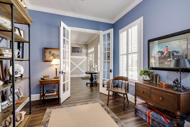 Wonderful coastal vibe home overlooking Cunning Lake. Coveted on The Reserve Club At Woodside Plantation in South Carolina - for sale on GolfHomes.com, golf home, golf lot