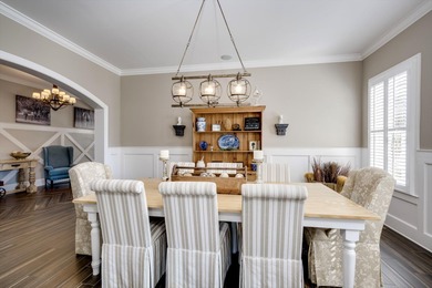 Wonderful coastal vibe home overlooking Cunning Lake. Coveted on The Reserve Club At Woodside Plantation in South Carolina - for sale on GolfHomes.com, golf home, golf lot