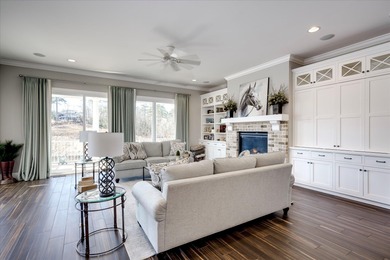 Wonderful coastal vibe home overlooking Cunning Lake. Coveted on The Reserve Club At Woodside Plantation in South Carolina - for sale on GolfHomes.com, golf home, golf lot