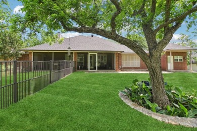 Walk out to the golf course from your large screened in back on Pecan Plantation Country Club in Texas - for sale on GolfHomes.com, golf home, golf lot
