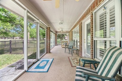 Walk out to the golf course from your large screened in back on Pecan Plantation Country Club in Texas - for sale on GolfHomes.com, golf home, golf lot