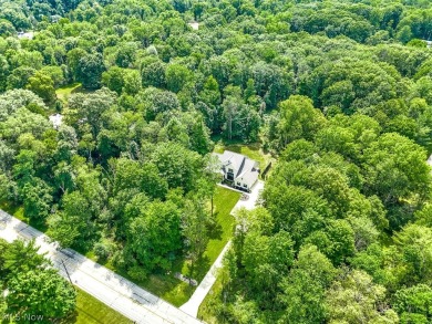 Nestled on over 1.5 wooded acres in Orange School District, this on The Country Club in Ohio - for sale on GolfHomes.com, golf home, golf lot