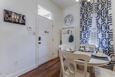 Step into coastal charm with this beautifully updated 2-bedroom on The Bridges Golf Club At Hollywood Casino in Mississippi - for sale on GolfHomes.com, golf home, golf lot