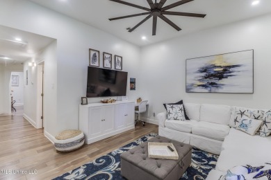 Step into coastal charm with this beautifully updated 2-bedroom on The Bridges Golf Club At Hollywood Casino in Mississippi - for sale on GolfHomes.com, golf home, golf lot