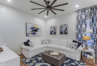 Step into coastal charm with this beautifully updated 2-bedroom on The Bridges Golf Club At Hollywood Casino in Mississippi - for sale on GolfHomes.com, golf home, golf lot