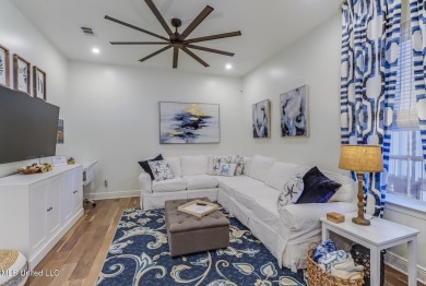 Step into coastal charm with this beautifully updated 2-bedroom on The Bridges Golf Club At Hollywood Casino in Mississippi - for sale on GolfHomes.com, golf home, golf lot