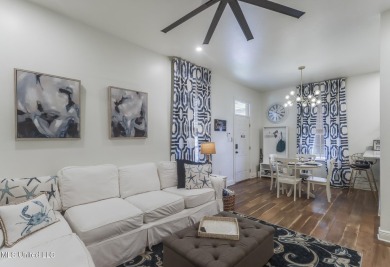 Step into coastal charm with this beautifully updated 2-bedroom on The Bridges Golf Club At Hollywood Casino in Mississippi - for sale on GolfHomes.com, golf home, golf lot