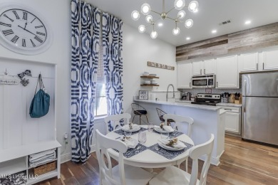 Step into coastal charm with this beautifully updated 2-bedroom on The Bridges Golf Club At Hollywood Casino in Mississippi - for sale on GolfHomes.com, golf home, golf lot