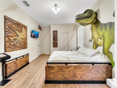 Here's your chance to own the World Famous Raptor Retreat!  This on The Oasis Club at Champions Gate in Florida - for sale on GolfHomes.com, golf home, golf lot