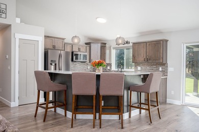 2.25% Assumable VA Loan - Home on the range...the driving range! on Quail Run Golf Course in Oregon - for sale on GolfHomes.com, golf home, golf lot