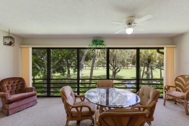 WELCOME to this CHARMING 2 bedroom, 2 bath condo END unit in the on IMG Academies Golf and Country Club in Florida - for sale on GolfHomes.com, golf home, golf lot