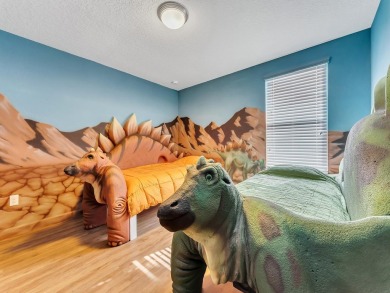 Here's your chance to own the World Famous Raptor Retreat!  This on The Oasis Club at Champions Gate in Florida - for sale on GolfHomes.com, golf home, golf lot