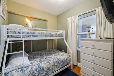 Wake up to the sound of waves and panoramic Gulf views from your on Holiday Golf Club in Florida - for sale on GolfHomes.com, golf home, golf lot