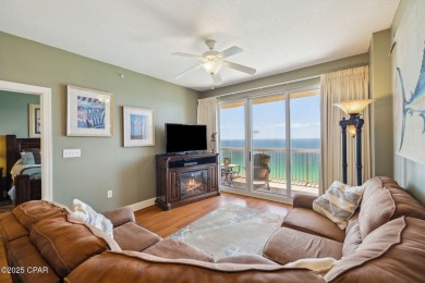 Wake up to the sound of waves and panoramic Gulf views from your on Holiday Golf Club in Florida - for sale on GolfHomes.com, golf home, golf lot