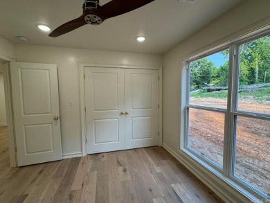 Beautiful modern 2025 New Build across from the North Golf on Cherokee Village North Course in Arkansas - for sale on GolfHomes.com, golf home, golf lot