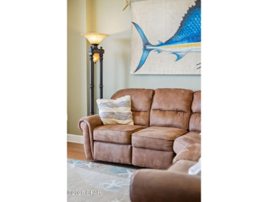 Wake up to the sound of waves and panoramic Gulf views from your on Holiday Golf Club in Florida - for sale on GolfHomes.com, golf home, golf lot