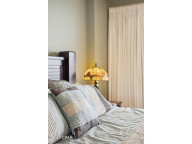Wake up to the sound of waves and panoramic Gulf views from your on Holiday Golf Club in Florida - for sale on GolfHomes.com, golf home, golf lot