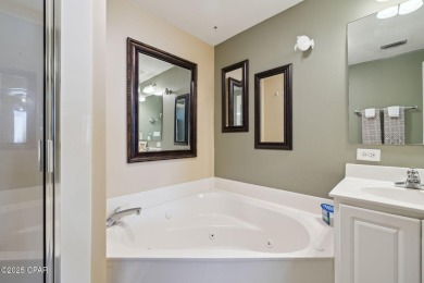 Wake up to the sound of waves and panoramic Gulf views from your on Holiday Golf Club in Florida - for sale on GolfHomes.com, golf home, golf lot