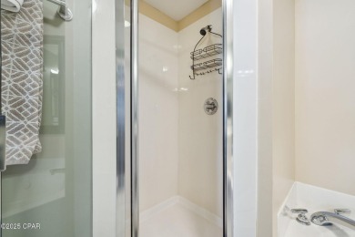 Wake up to the sound of waves and panoramic Gulf views from your on Holiday Golf Club in Florida - for sale on GolfHomes.com, golf home, golf lot