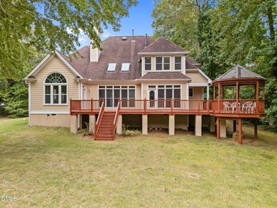 Nestled on nearly half an acre along the 2 mile long Lochmere on Lochmere Golf Club in North Carolina - for sale on GolfHomes.com, golf home, golf lot