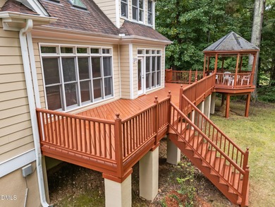 Nestled on nearly half an acre along the 2 mile long Lochmere on Lochmere Golf Club in North Carolina - for sale on GolfHomes.com, golf home, golf lot