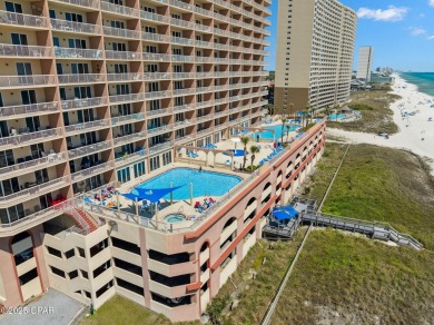 Wake up to the sound of waves and panoramic Gulf views from your on Holiday Golf Club in Florida - for sale on GolfHomes.com, golf home, golf lot