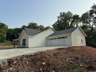 Beautiful modern 2025 New Build across from the North Golf on Cherokee Village North Course in Arkansas - for sale on GolfHomes.com, golf home, golf lot