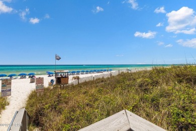 Wake up to the sound of waves and panoramic Gulf views from your on Holiday Golf Club in Florida - for sale on GolfHomes.com, golf home, golf lot