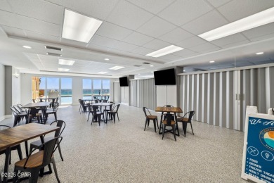 Wake up to the sound of waves and panoramic Gulf views from your on Holiday Golf Club in Florida - for sale on GolfHomes.com, golf home, golf lot