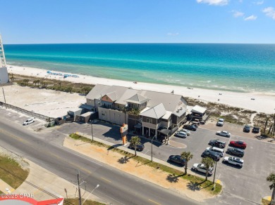Wake up to the sound of waves and panoramic Gulf views from your on Holiday Golf Club in Florida - for sale on GolfHomes.com, golf home, golf lot