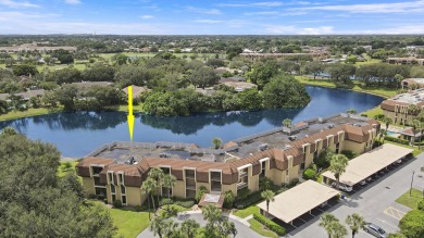 Welcome to this spacious 1st floor unit with covered parking on BallenIsles Golf and Country Club in Florida - for sale on GolfHomes.com, golf home, golf lot