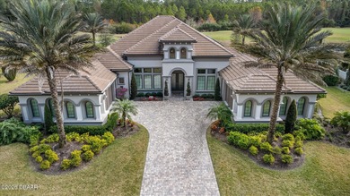 Live where every day feels like a private retreat. This former on Plantation Bay Golf and Country Club in Florida - for sale on GolfHomes.com, golf home, golf lot
