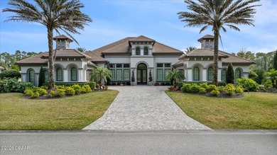 Live where every day feels like a private retreat. This former on Plantation Bay Golf and Country Club in Florida - for sale on GolfHomes.com, golf home, golf lot