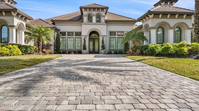 Live where every day feels like a private retreat. This former on Plantation Bay Golf and Country Club in Florida - for sale on GolfHomes.com, golf home, golf lot