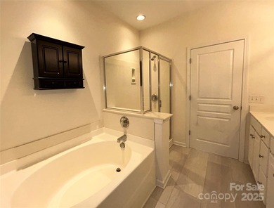 Located in the highly desirable Highland Creek community, this on Highland Creek Golf Club in North Carolina - for sale on GolfHomes.com, golf home, golf lot