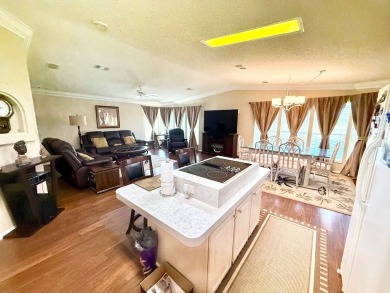 EXQUISTE LAKEFRONT HOME IN A GATED COMMUNITY OFFERING on Cypress Greens in Florida - for sale on GolfHomes.com, golf home, golf lot