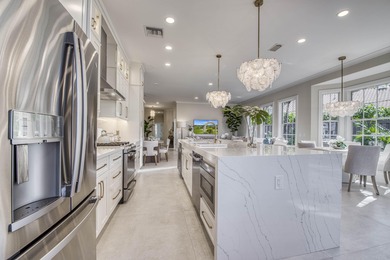 Why wait to build when this fully renovated, move-in ready on PGA National Golf Club in Florida - for sale on GolfHomes.com, golf home, golf lot