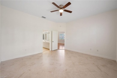Discover Southwest Florida living in this 2-bedroom plus den on Cypress Lake Country Club in Florida - for sale on GolfHomes.com, golf home, golf lot
