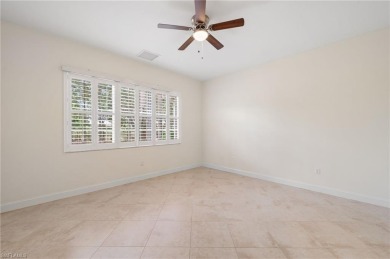 Discover Southwest Florida living in this 2-bedroom plus den on Cypress Lake Country Club in Florida - for sale on GolfHomes.com, golf home, golf lot