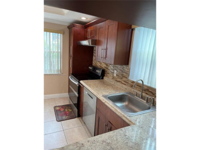 Large corner unit, fully updated and Move-in Ready in the on Inverrary Country Club in Florida - for sale on GolfHomes.com, golf home, golf lot