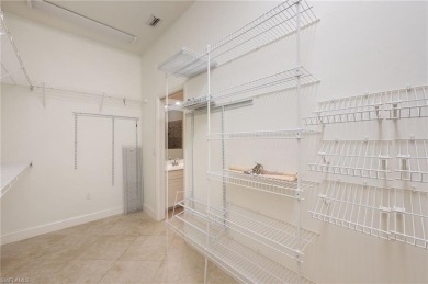Discover Southwest Florida living in this 2-bedroom plus den on Cypress Lake Country Club in Florida - for sale on GolfHomes.com, golf home, golf lot