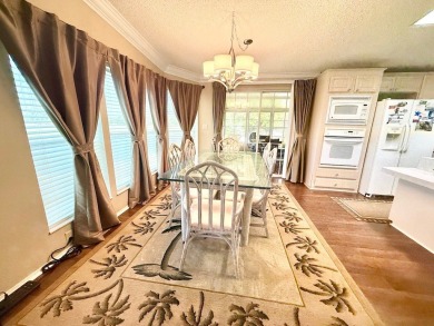 EXQUISTE LAKEFRONT HOME IN A GATED COMMUNITY OFFERING on Cypress Greens in Florida - for sale on GolfHomes.com, golf home, golf lot