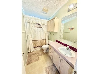 EXQUISTE LAKEFRONT HOME IN A GATED COMMUNITY OFFERING on Cypress Greens in Florida - for sale on GolfHomes.com, golf home, golf lot
