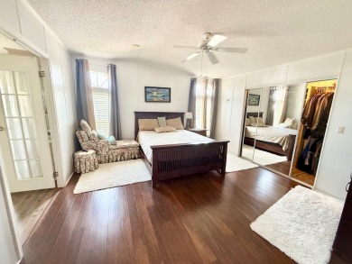 EXQUISTE LAKEFRONT HOME IN A GATED COMMUNITY OFFERING on Cypress Greens in Florida - for sale on GolfHomes.com, golf home, golf lot