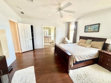 EXQUISTE LAKEFRONT HOME IN A GATED COMMUNITY OFFERING on Cypress Greens in Florida - for sale on GolfHomes.com, golf home, golf lot