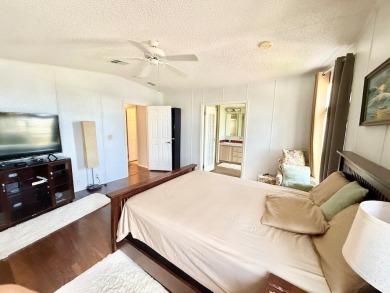 EXQUISTE LAKEFRONT HOME IN A GATED COMMUNITY OFFERING on Cypress Greens in Florida - for sale on GolfHomes.com, golf home, golf lot